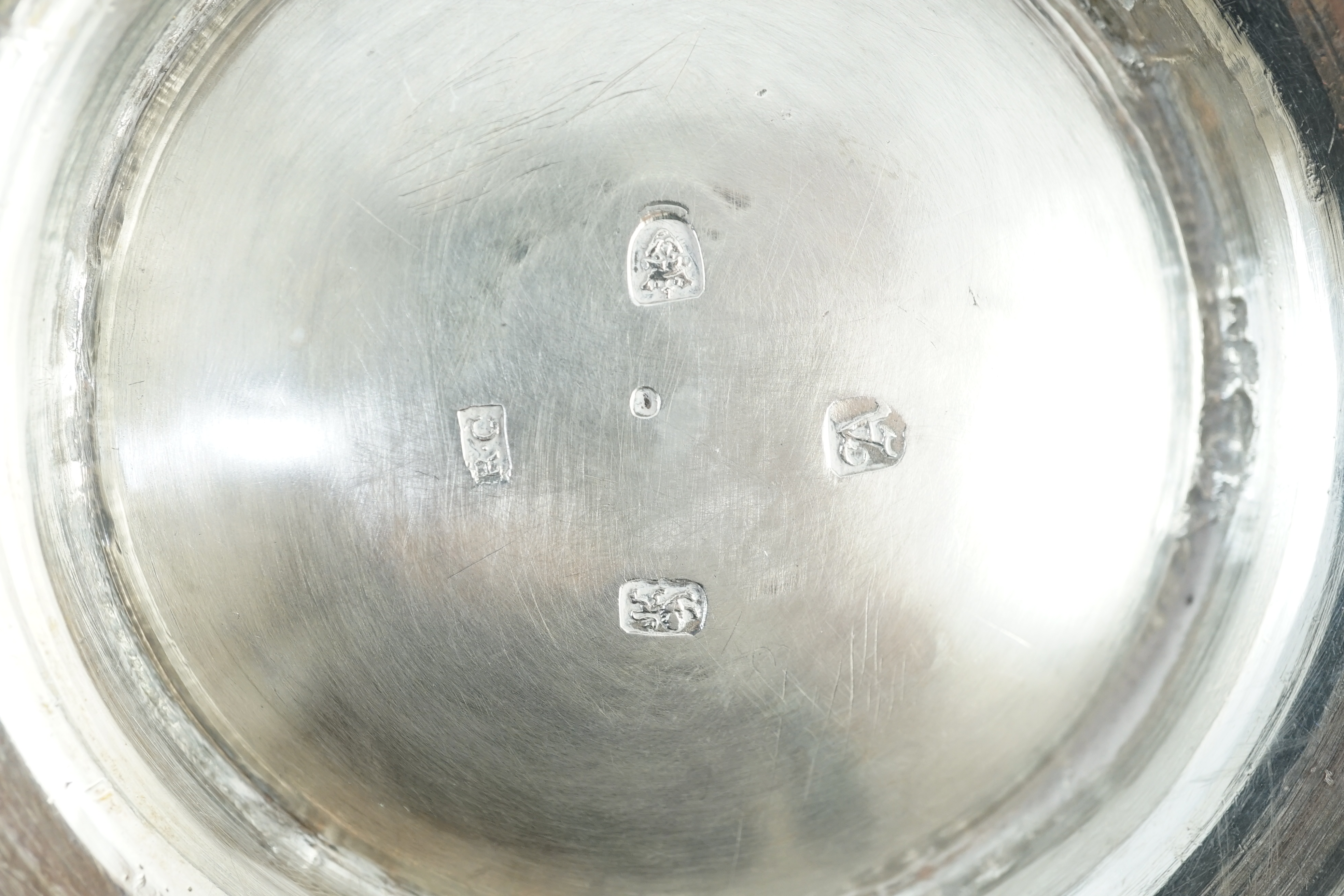 A George II silver baluster tankard, with later embossed decoration, by Robert Albin Cox